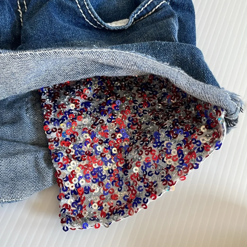 Justice denim jean shorts with red, blue & silver sequins. Girls size 10